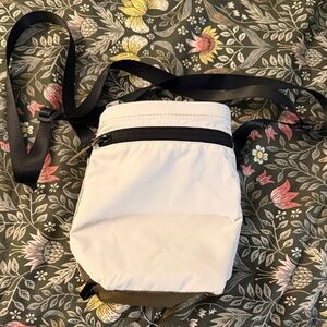 White Crossbody Water 💦 Bottle Bag with Black Strap